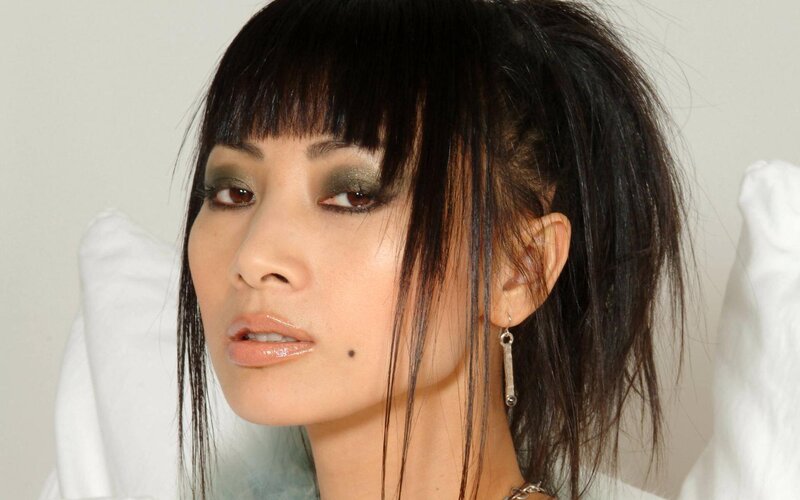 Woman with Dark Hair — Black, Neutral, Photograph, Earring, Makeup, Pillow