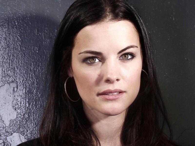 Woman with Dark Hair — Black, Neutral, Photograph, Hoop Earrings, Dark Background