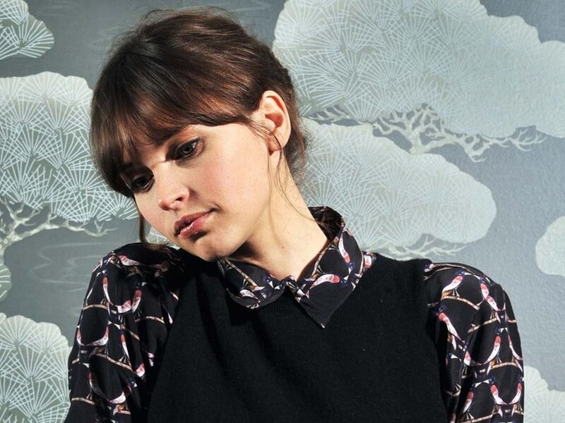 Woman with Dark Hair — Black, Neutral, Photograph, Patterned Shirt