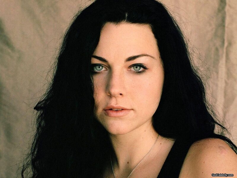 Woman with Dark Hair — Black, Serious, Photograph