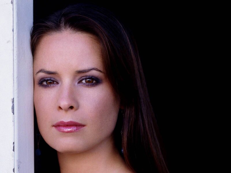 Woman with Dark Hair — Black, Serious, Photograph, Wall