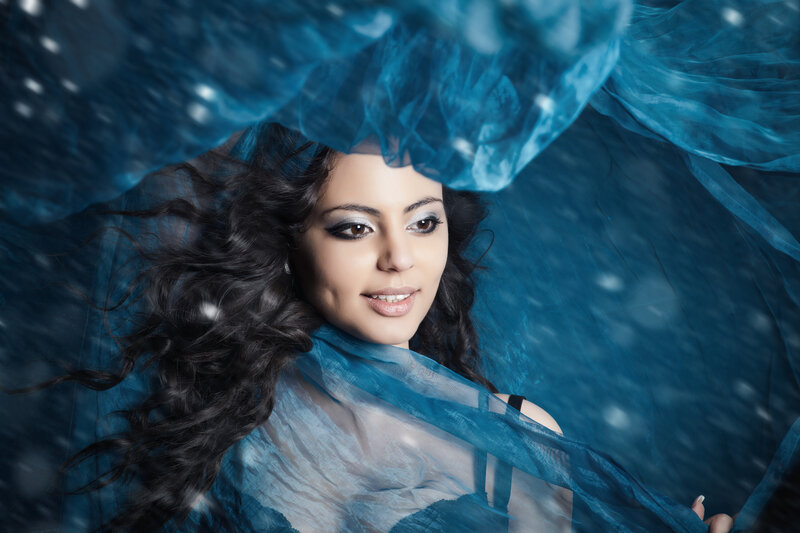 Woman with Dark Hair — Blue, Dramatic, Photograph, Blue Fabric