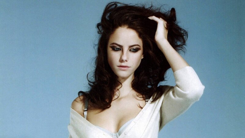 Woman with Dark Hair — Blue, Dramatic, Photograph, White Sweater