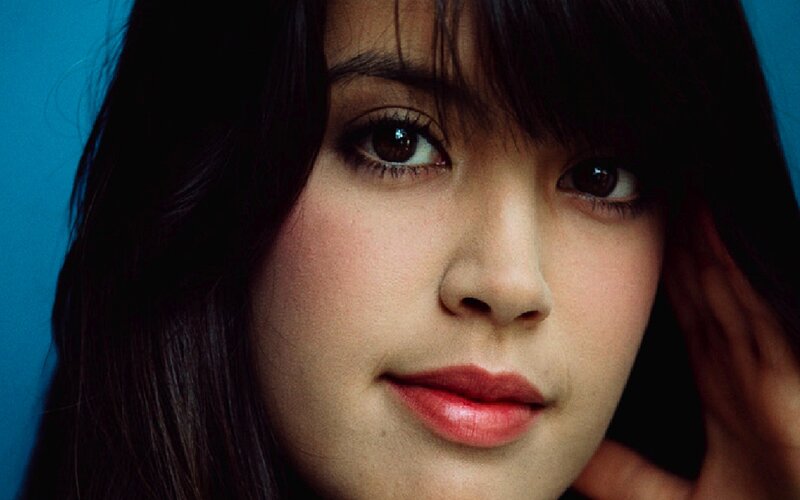 Woman with Dark Hair — Blue, Intense, Photograph