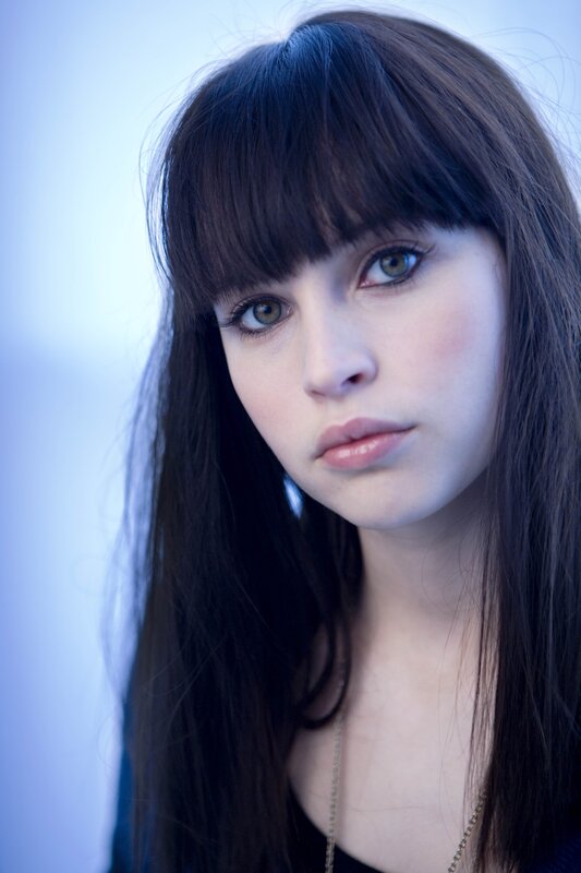 Woman with Dark Hair — Blue, Neutral, Photograph, Bangs