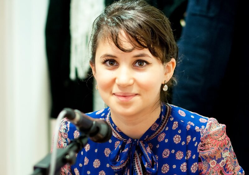Woman with Dark Hair — Blue, Neutral, Photograph, Microphone