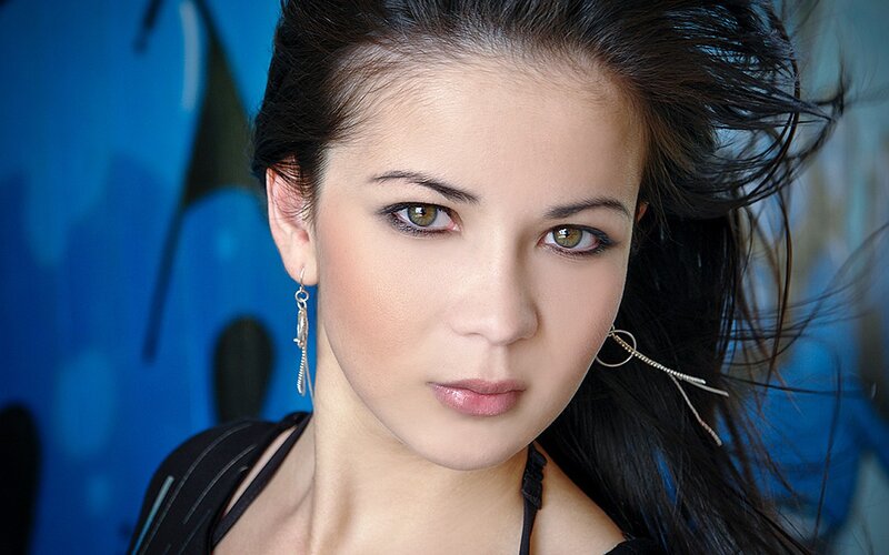 Woman with Dark Hair — Blue, Serious, Photograph