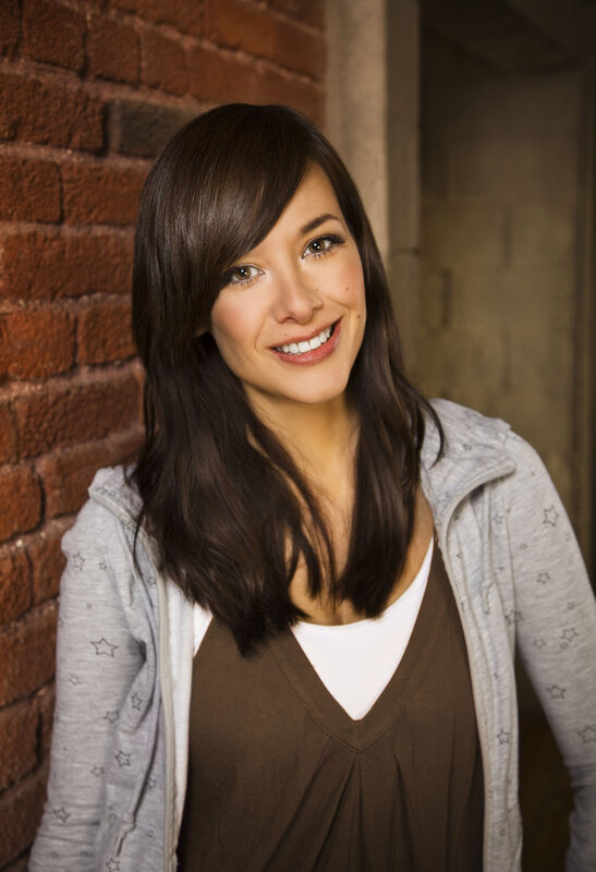 Woman with Dark Hair — Brown, Friendly, Photograph, Brick Wall