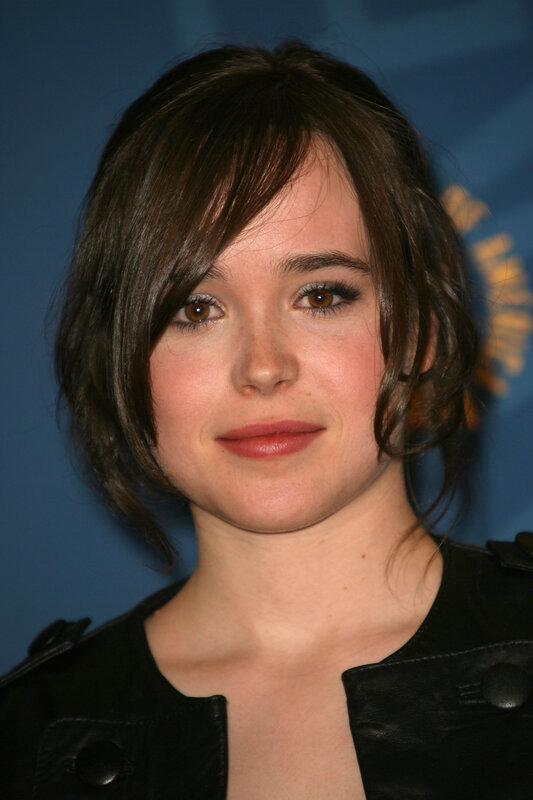 Woman with Dark Hair — Brown, Neutral, Photograph, Black Jacket