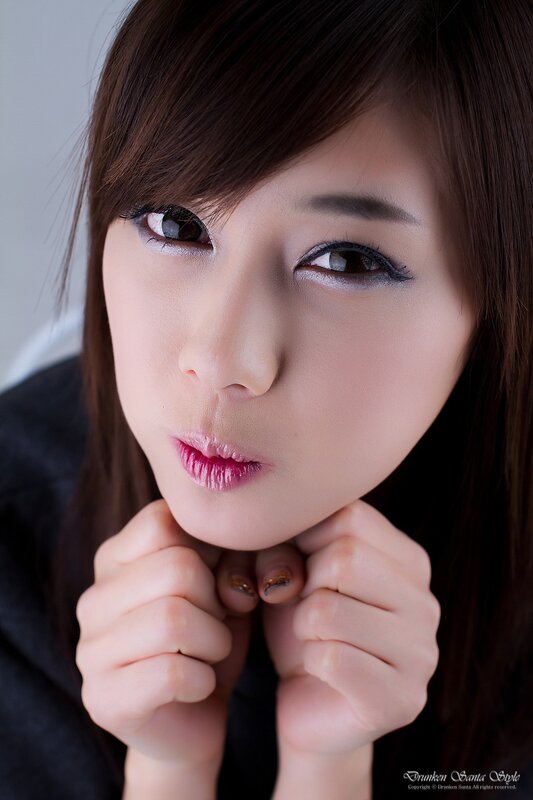 Woman with Dark Hair — Brown, Neutral, Photograph, Makeup, Hands