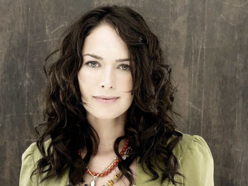 Woman with Dark Hair — Brown, Neutral, Photograph, Necklace, Green Shirt