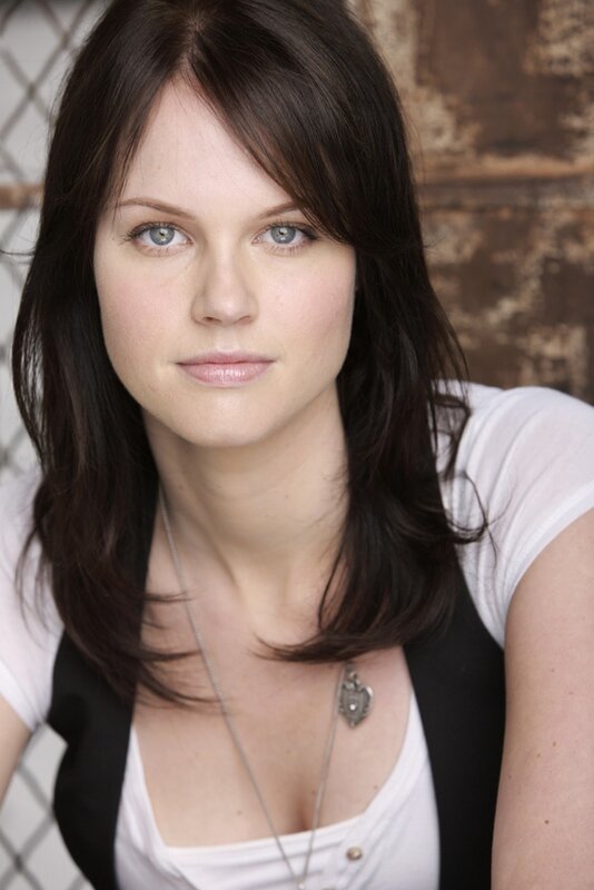 Woman with Dark Hair — Brown, Neutral, Photograph, White Shirt, Black Vest