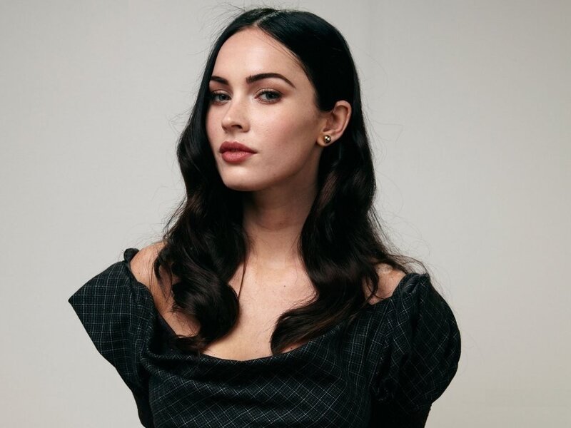 Woman with Dark Hair — Earring, Black Top