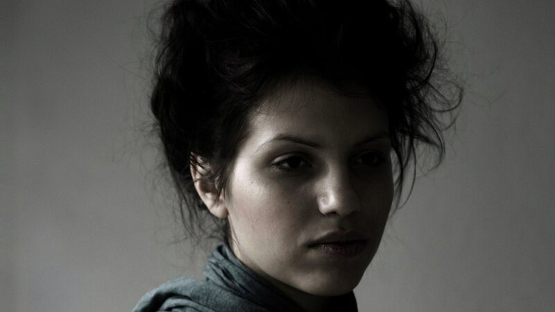 Woman with Dark Hair — Gray, Dramatic, Photograph, Scarf