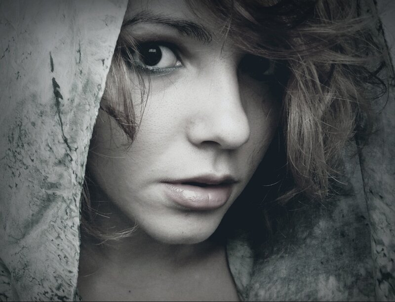 Woman with Dark Hair — Gray, Dramatic