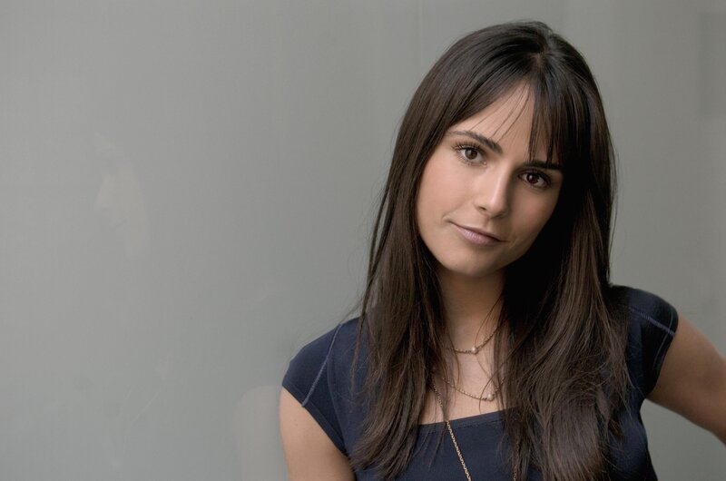Woman with Dark Hair — Gray, Neutral, Photograph, Necklace, Blue Top, Brown