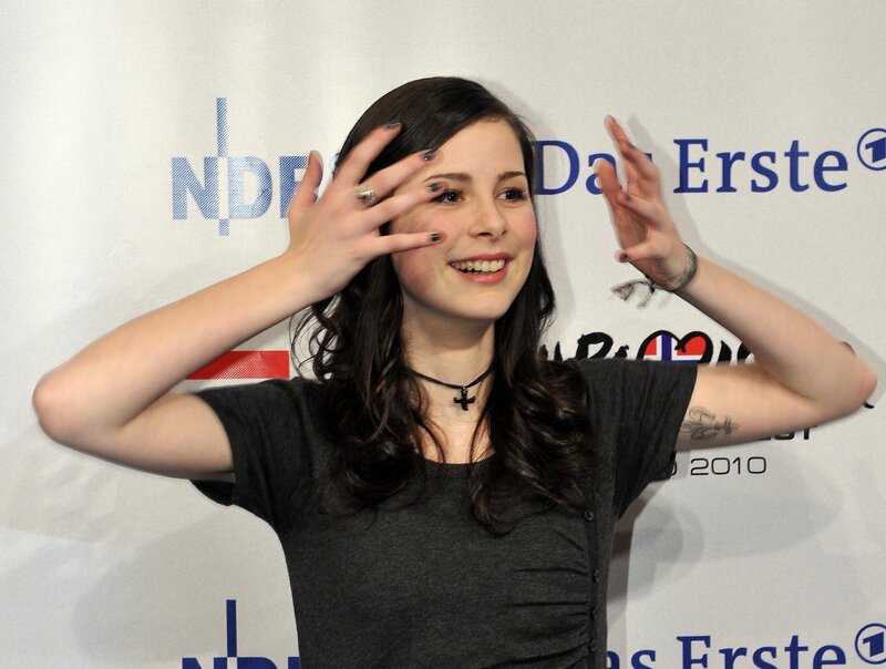 Woman with Dark Hair — Gray, Playful, Photograph, Hands