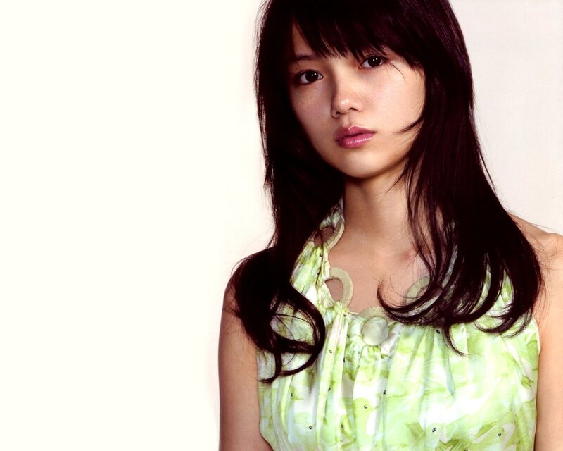 Woman with Dark Hair — Green, Neutral, Photograph, Green Top, White Background