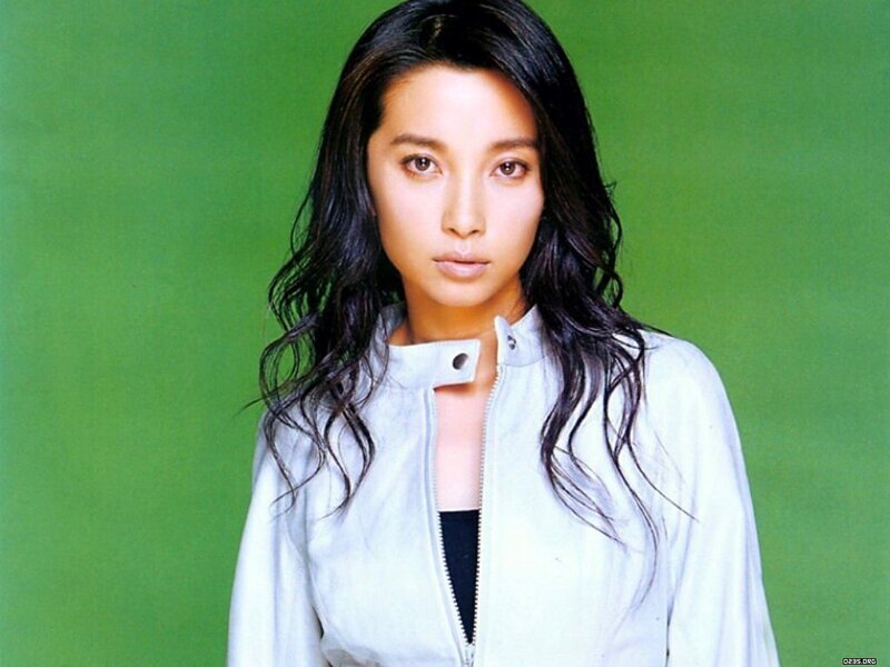 Woman with Dark Hair — Green, Neutral, Photograph, Jacket