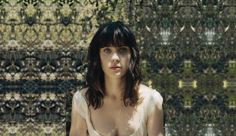 Woman with Dark Hair — Green, Serious, Afternoon