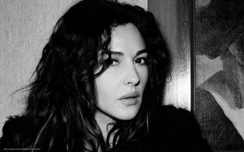 woman with dark hair in black and white