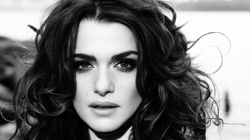 woman with dark hair in black and white