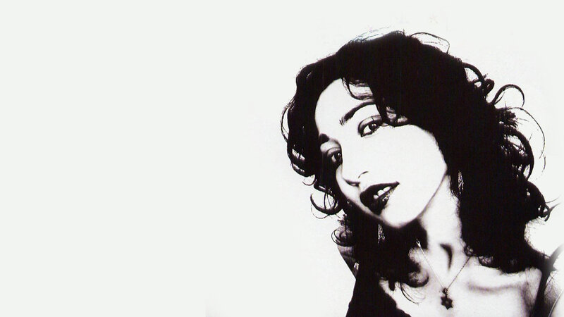 woman with dark hair in black and white