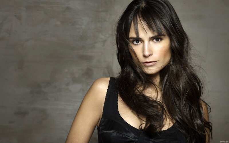 woman with dark hair in black top