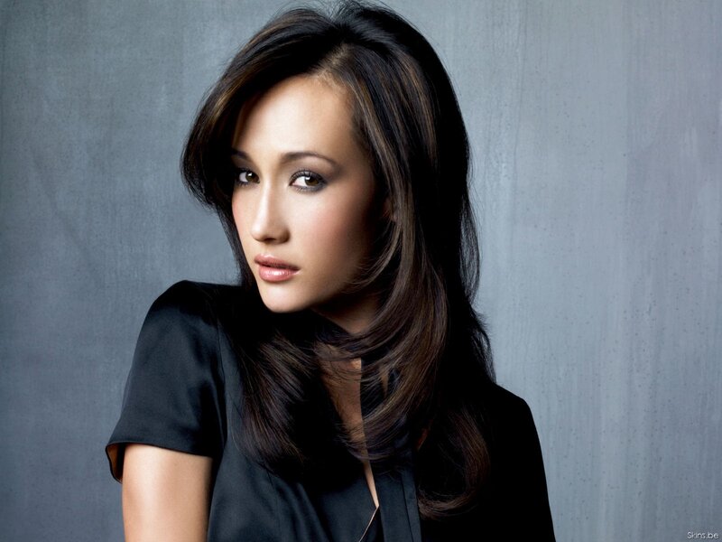 woman with dark hair in black top