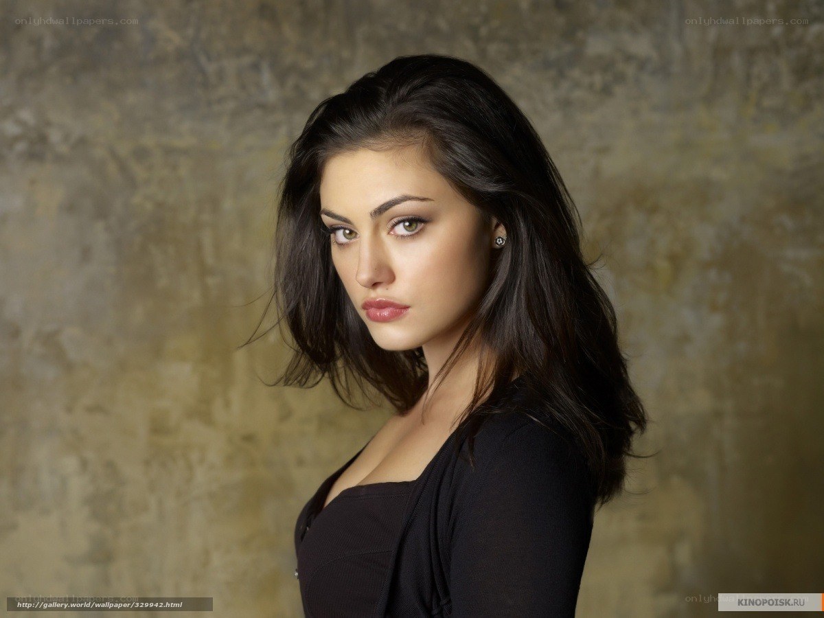 woman with dark hair in black top