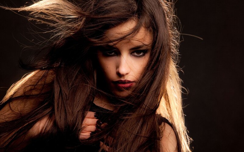 woman with dark hair in motion