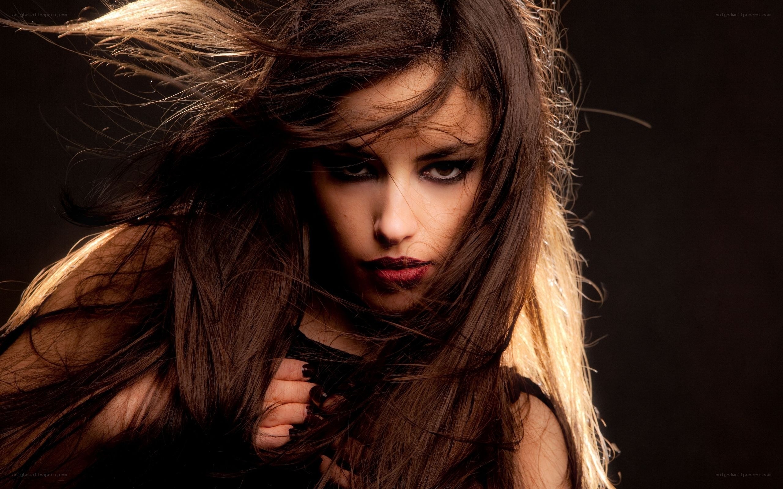 woman with dark hair in motion