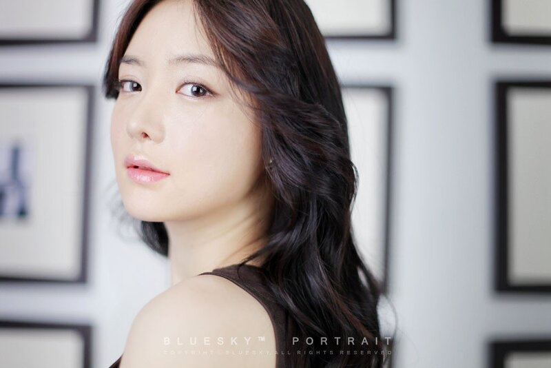 woman with dark hair in portrait