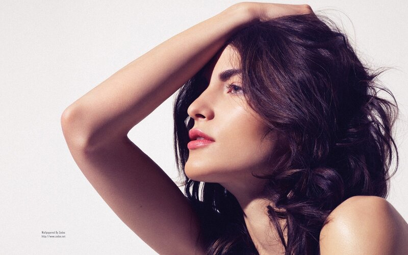 woman with dark hair in profile