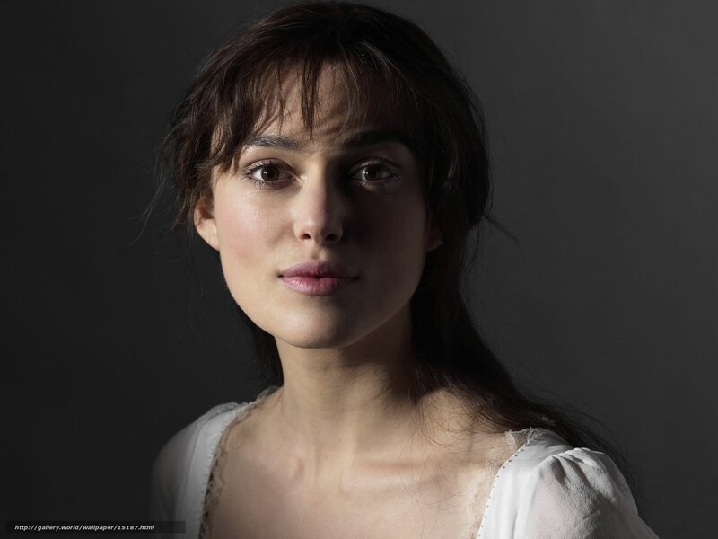 woman with dark hair in studio