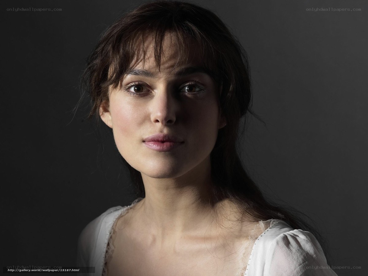 woman with dark hair in studio
