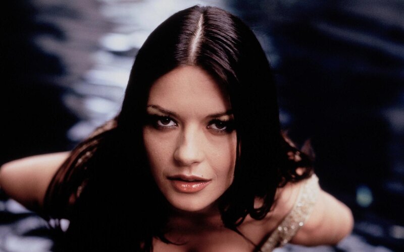woman with dark hair in water