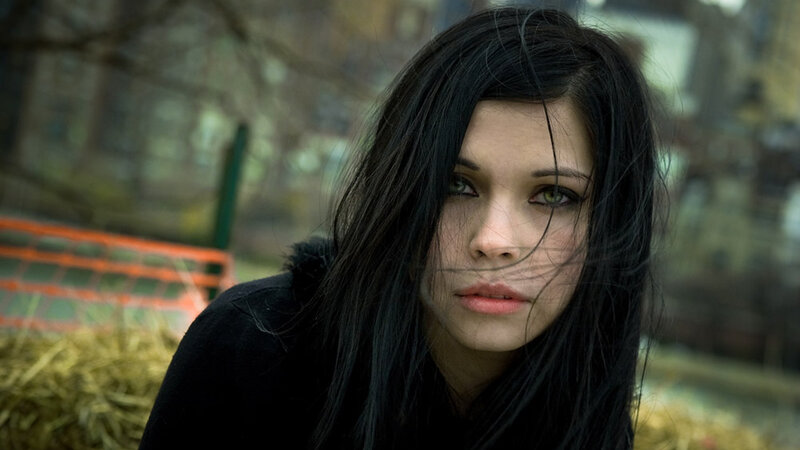 woman with dark hair in wind