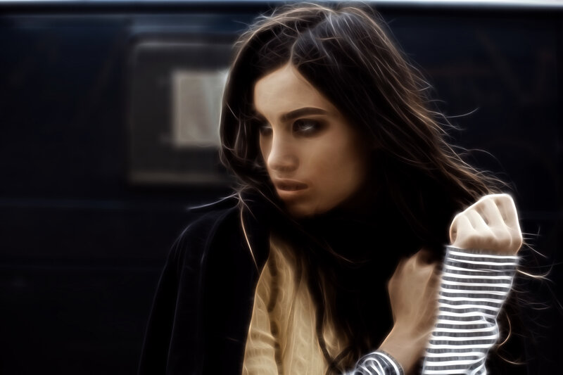 woman with dark hair in wind