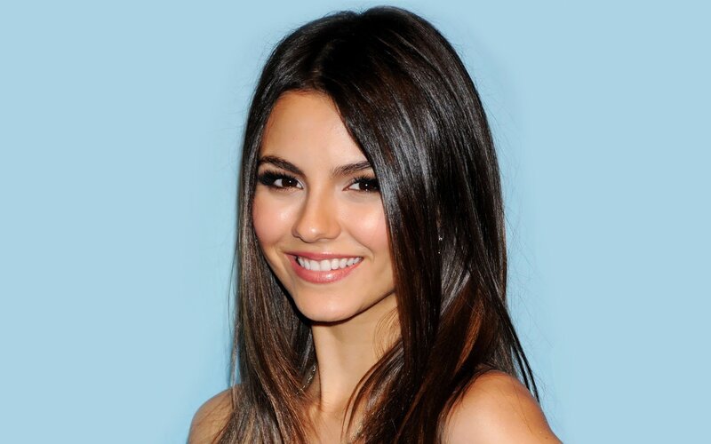 Woman with Dark Hair — Light Blue, Neutral, Photograph, Smile