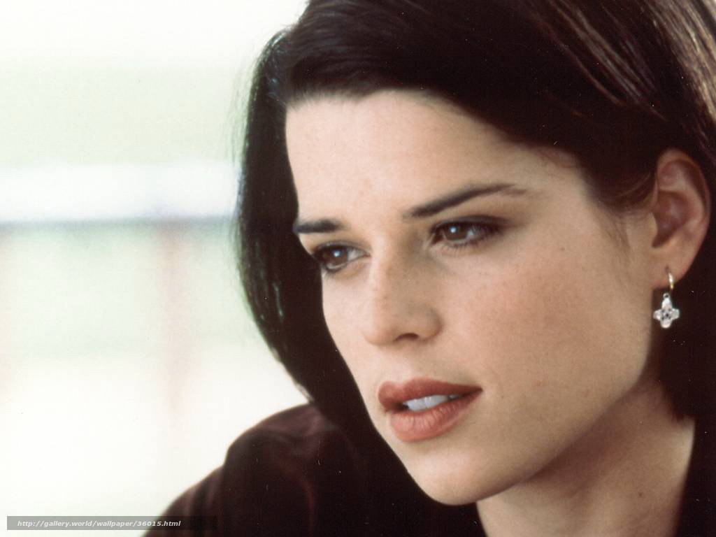 woman with dark hair looking away