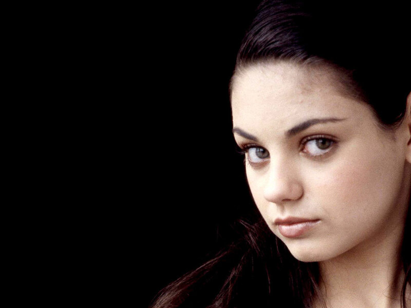 woman with dark hair looking