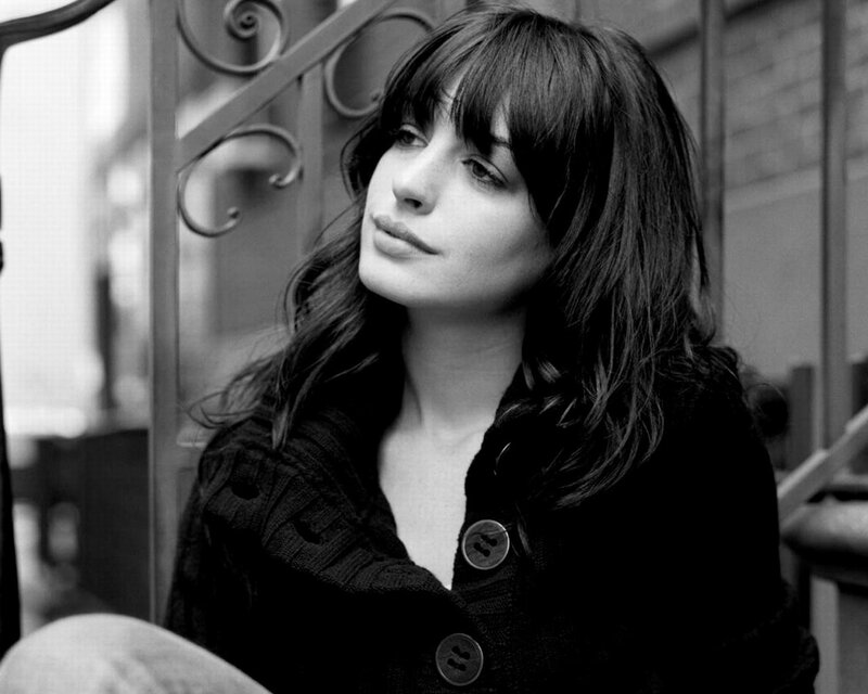 woman with dark hair looking up