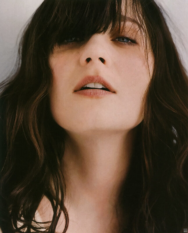 woman with dark hair looking up
