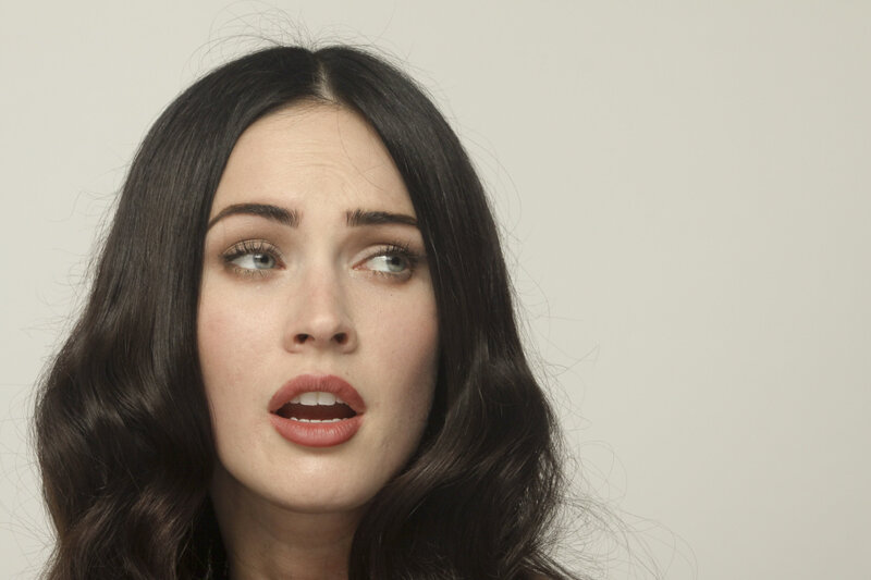 woman with dark hair looking up