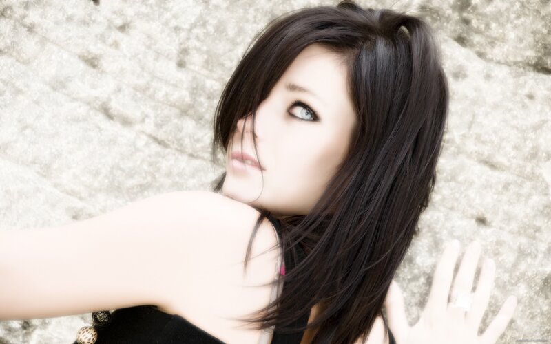woman with dark hair lying down