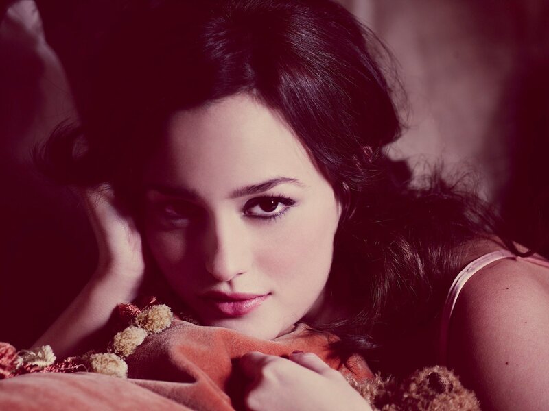 woman with dark hair lying down