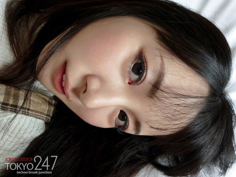 woman with dark hair lying down