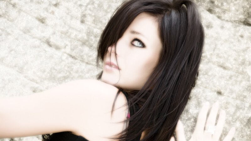 woman with dark hair lying down