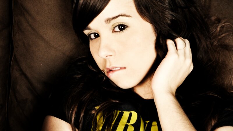 woman with dark hair lying down